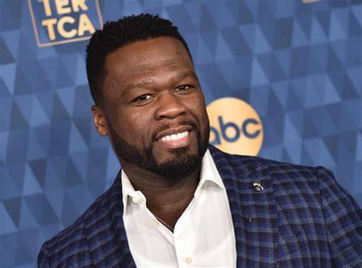 50 Cent Signs Major Deal for Get The Strap Phrase