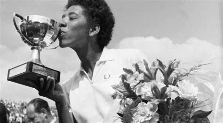Althea Neale Gibson with her precious award