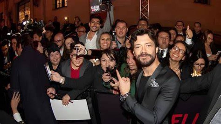 Alvaro Morte with his cast of La Casa De Papel