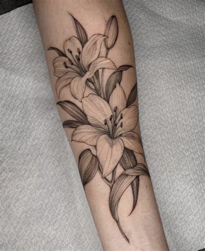 Back And Side Pieces Lily Tattoo Nerotattoostudio