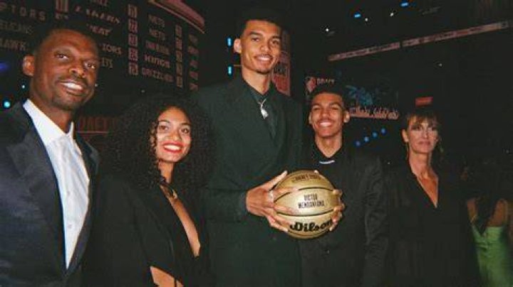 Former basketball player with family
