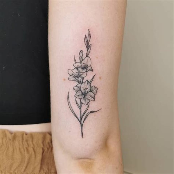 Gladiolus Flower Ankle Tattoo becca_tattoo