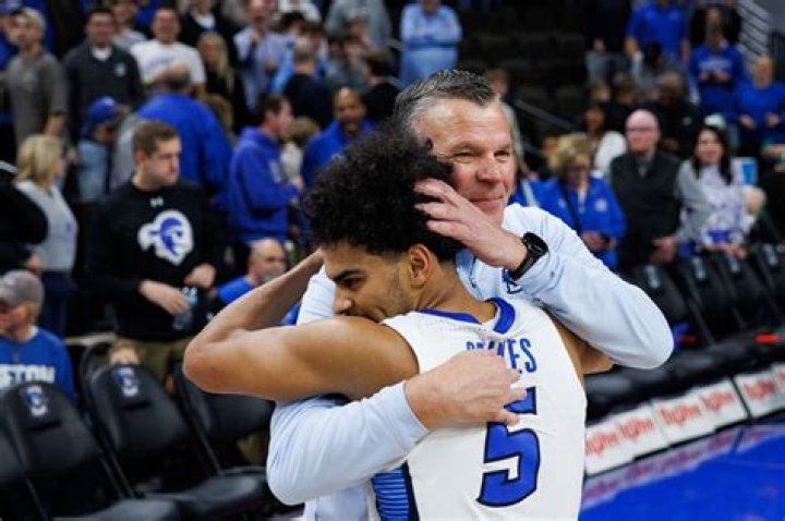 Greg McDermott Along With His Daughter