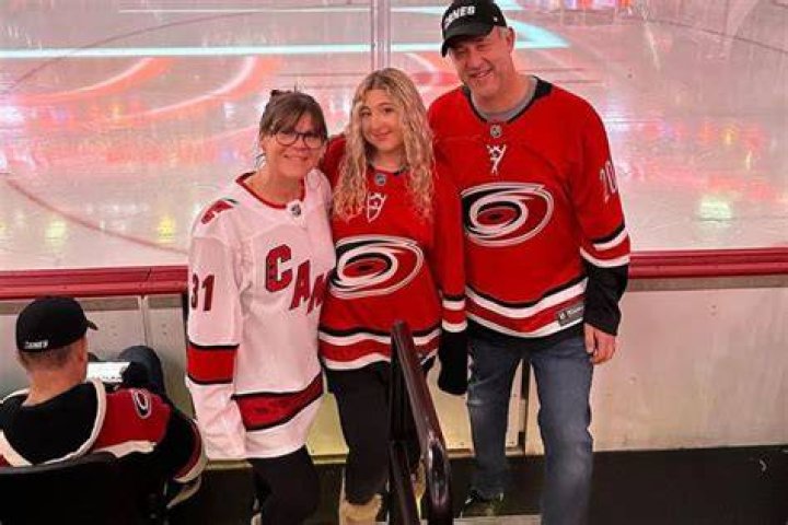 Jeff Goodman Pictured With His Family At The Carolina Hurricanes Game