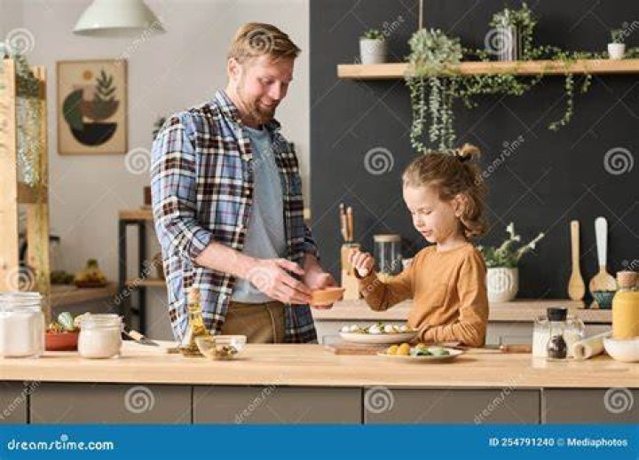 Little Cook with his dad (Source: cleveland.com)