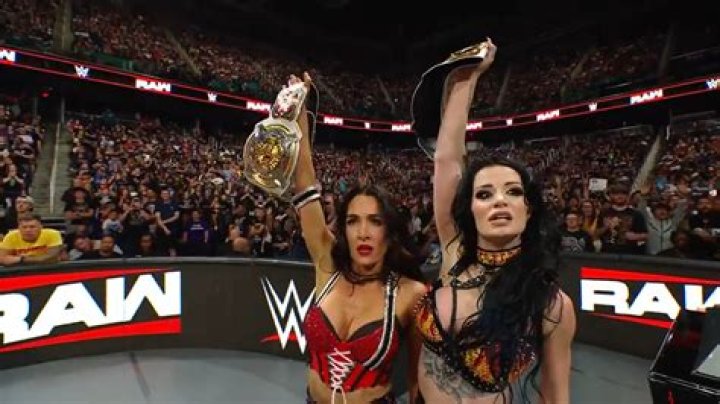 Paige holding Diva's Championship title