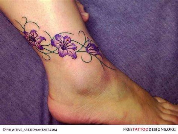 Purple Flower Ankle Tattoo nikita.tattoo