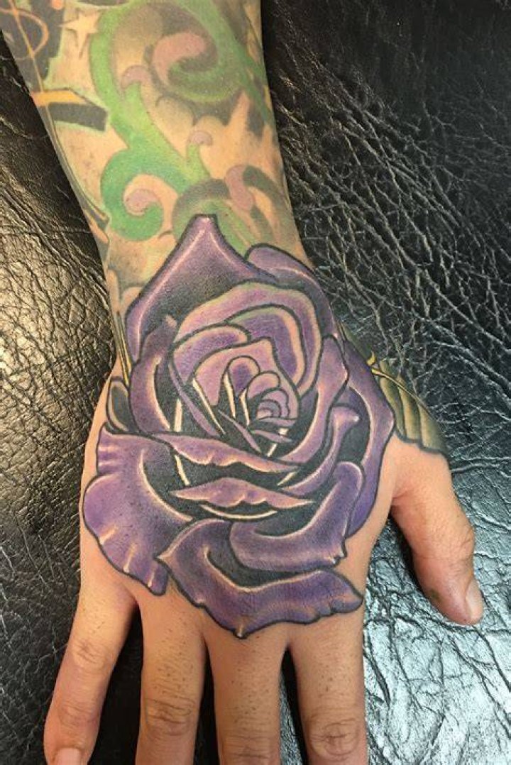 Purple Flower Hand Tattoo cotycastle