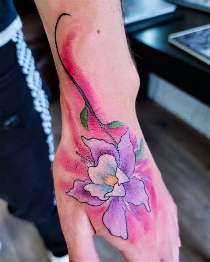 Purple Flower Hand Tattoo fax_tats