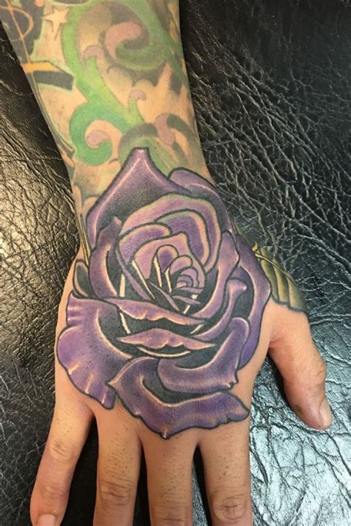 Purple Flower Hand Tattoo infiniteink_coventry