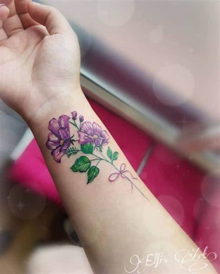 Purple Flower Wrist Tattoo turnertatz