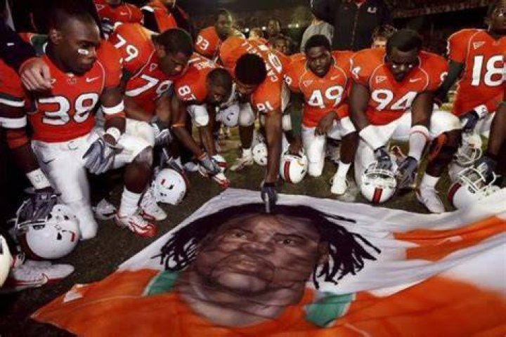 Rashaun Jones (No.38) Pictured Mourning Pata's Death With Miami Teammates