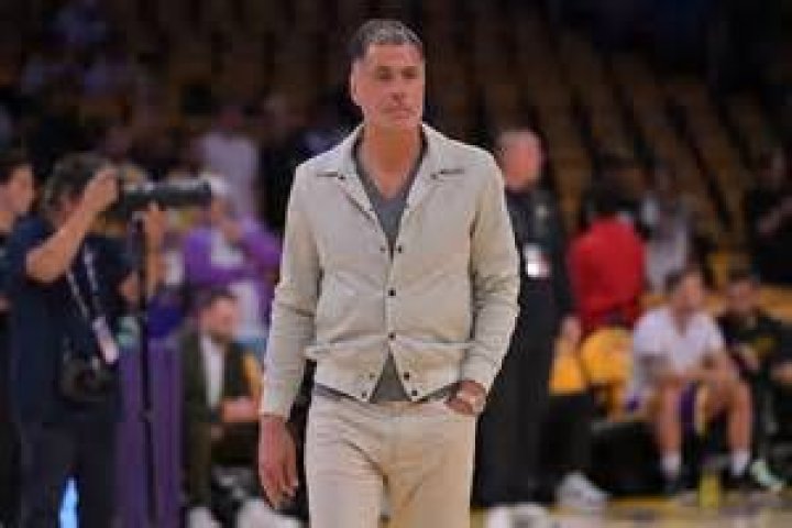 Rob Pelinka at the Court trying to guard.