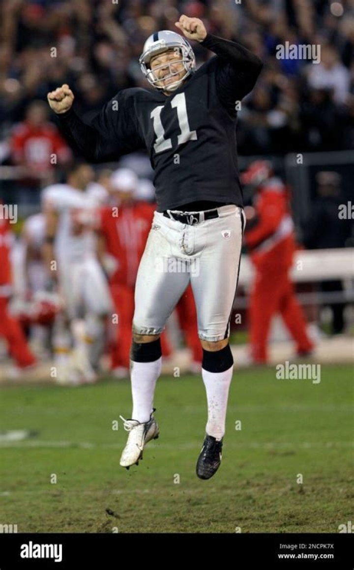 Sebastian Janikowski Leaps After Scoring The Winning Field Goal In Overtime