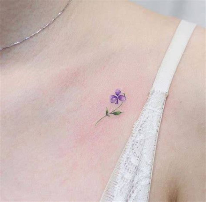 Small Purple Flower Tattoo corpusliberi