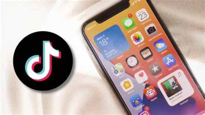 TikTok on a phone next to a chair